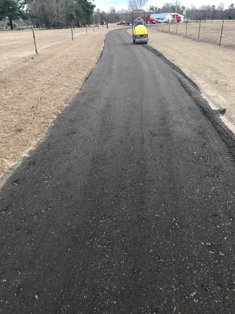 Recycled asphalt millings spread and compacted for a driveway surface